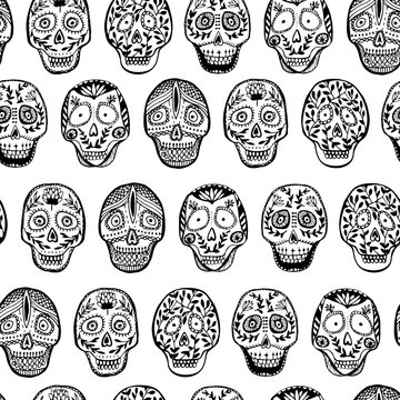 Hand drawn mexican skull seamless pattern with floral ornament.