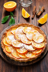 Pie with orange caramelized slices