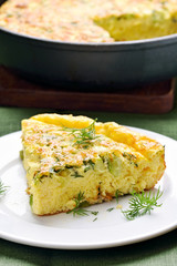 Omelette with herbs, cheese and zucchini