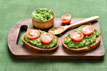 Sandwiches with pesto and tomatoes