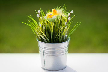 Easter spring style. Easter eggs and chickens in nest. 1