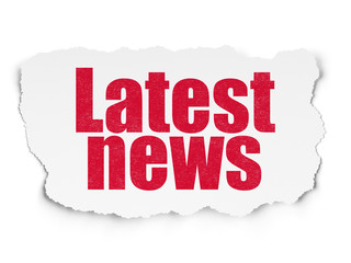 News concept: Latest News on Torn Paper background