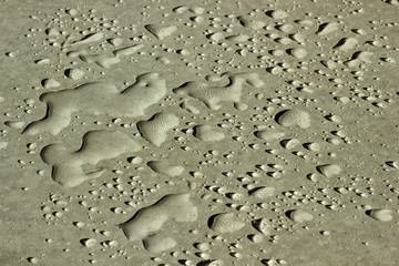 Drops of water on the table. Green