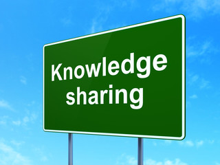 Learning concept: Knowledge Sharing on road sign background