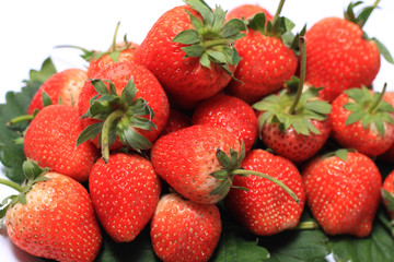 Fresh strawberry on wooden tray.