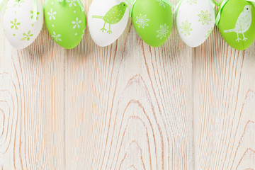 Easter eggs on wooden table
