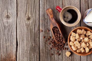 Coffee cup, beans and brown sugar