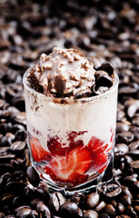 Coffee dessert with vanilla ice cream, fresh strawberries, choco