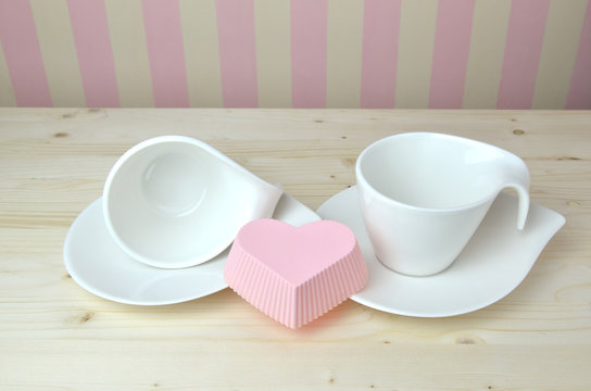 Porcelain Cups and Saucers in Kitchen