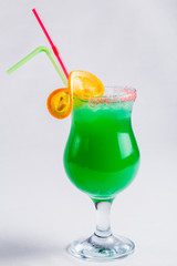 Green cocktail on white background