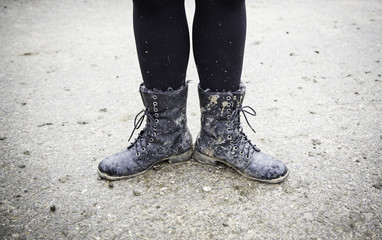 Women boots in the mud