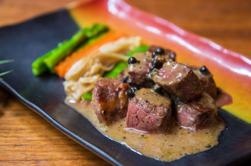 Beef steak with pepper sauce
