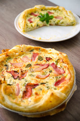 Homemade Spinach and Bacon Egg Quiche in a pie crust. French cuisine