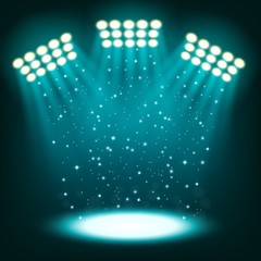 Bright stadium spotlights on dark blue background