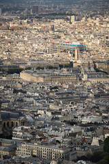 Fototapeta na wymiar Aerial view, rooftops of the 4th arrondissement in Paris including Ile de la Cite, Tour Saint Jacques and Centre Georges Pompidou (Pompidou Center) in the Marais. France