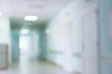 Fotobehang blurry hospital corridor © kavzov