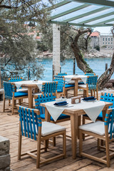 Tables at seaside restaurant with beautiful view