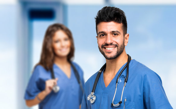 Portrait of two smiling medical workers