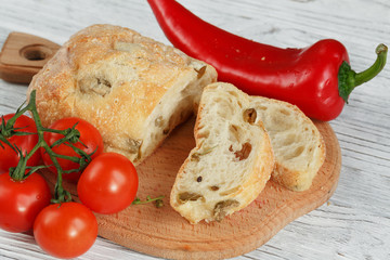 Sliced bread Ciabatta and vegetables