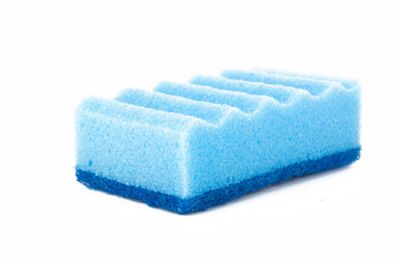 Obraz na płótnie Canvas sponge for washing utensils blue color on a white background