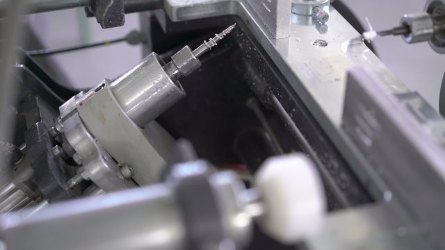 Closeup machine of automatic line for PVC windows manufacturing. 4K