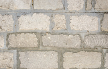 Fototapeta premium Texture of gray stone wall