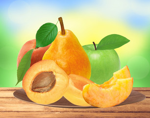 fresh apricot, peach, apple and pear on wooden plate over nature