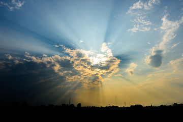  sun rays are striking through the clouds