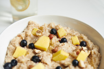 oatmeal with mango and berries