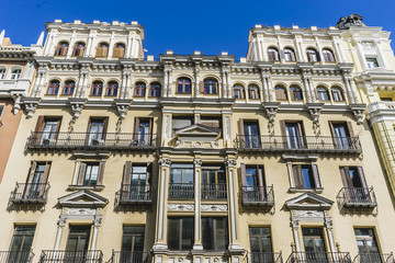 characteristic buildings on the street Gran Via in Madrid, capit