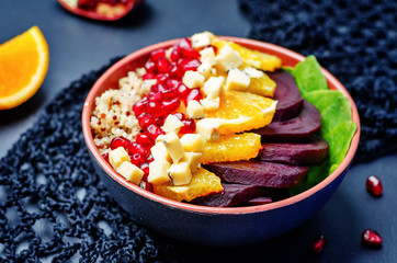 Quinoa spinach beet orange pomegranate blue cheese salad