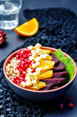 Quinoa spinach beet orange pomegranate blue cheese salad