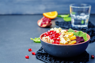 Quinoa spinach beet orange pomegranate blue cheese salad