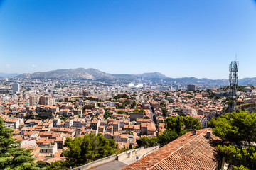 Fototapeta na wymiar Marseille. View of the city and surrounding mountains from the Garde hill