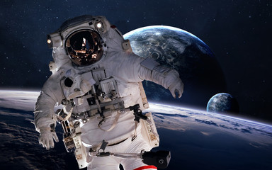 Astronaut in outer space. Spacewalk. Elements of this image furnished by NASA
