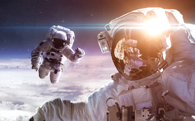 Plakat Astronaut in outer space. Spacewalk. Elements of this image furnished by NASA