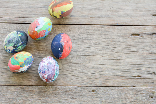 Easter eggs on the wooden floor