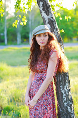 Beauty girl in the cap on outdoors