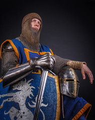 A man in knight's armour.