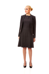 Beautiful business woman looking up at copy space or something