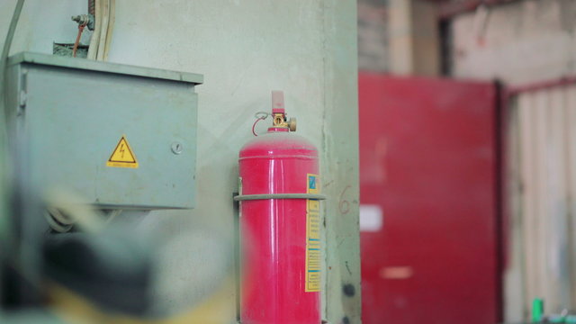 Electroshield and a fire extinguisher in the factory 4K