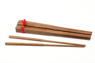 pack of wooden chopsticks isolated on white background