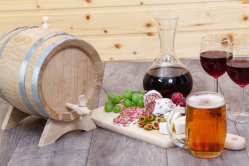 Wine and cheese, meat and fruit.
