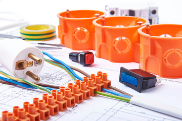 Components for use in electrical installations. Plug, connectors, junction box, switch, isolation tape and 

wires. Accessories for engineering work, energy concept.
