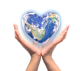 Blue planet in heart shape over woman human hands isolated on white background: World heart day idea symbolic concept campaign to promote health awareness: Elements of this image furnished by NASA