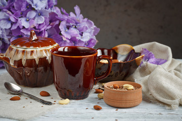 Healthy breakfast. Cup of green tea, cottage cheese plus oat fla