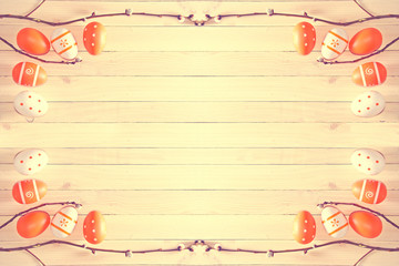 Easter eggs on wooden background.