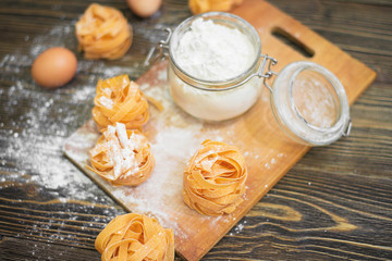 Close-up overhead shot of cookie ingredient on wooden table.