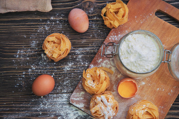 Close-up overhead shot of cookie ingredient on wooden table.