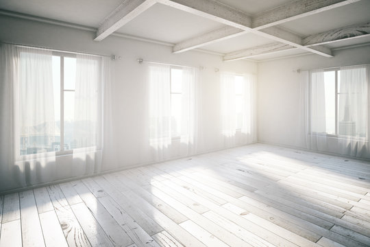 Blank bright loft interior with windows and sunlight
